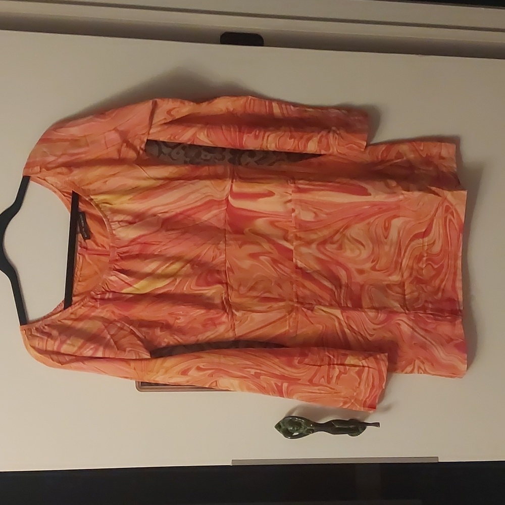 Orange swirl pattern dress